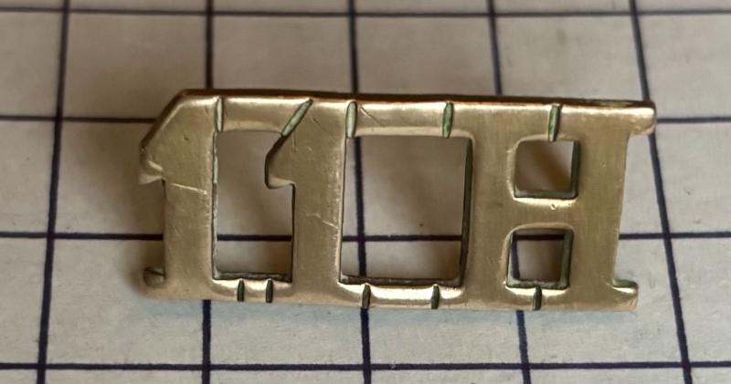 The 11th Hussars (Prince Albert's Own) Brass Metal Shoulder Title Badge