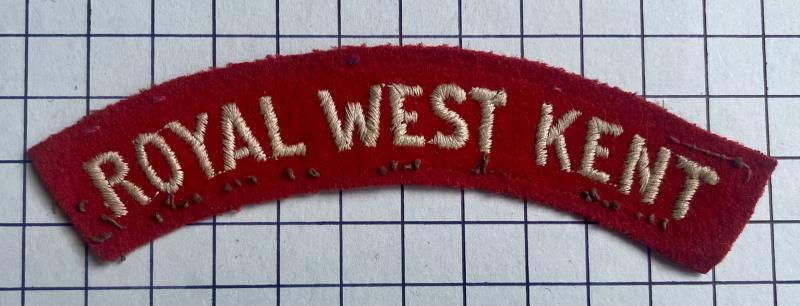 The Queen's Own Royal West Kent Regiment Woven White on Red Felt Cloth Shoulder Title Patch