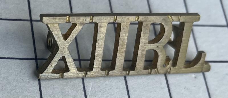 cWW2 Locally Cast 12th (Prince of Wales) Royal Lancers Brass Shoulder Title Badge