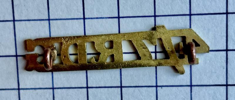 Post 1936 4th/7th Royal Dragoon Guards (RDG) Officer Pattern Small Shoulder Title Gilding Metal Badge